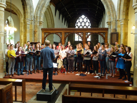 Rehearsing for the choir's 15th anniversary